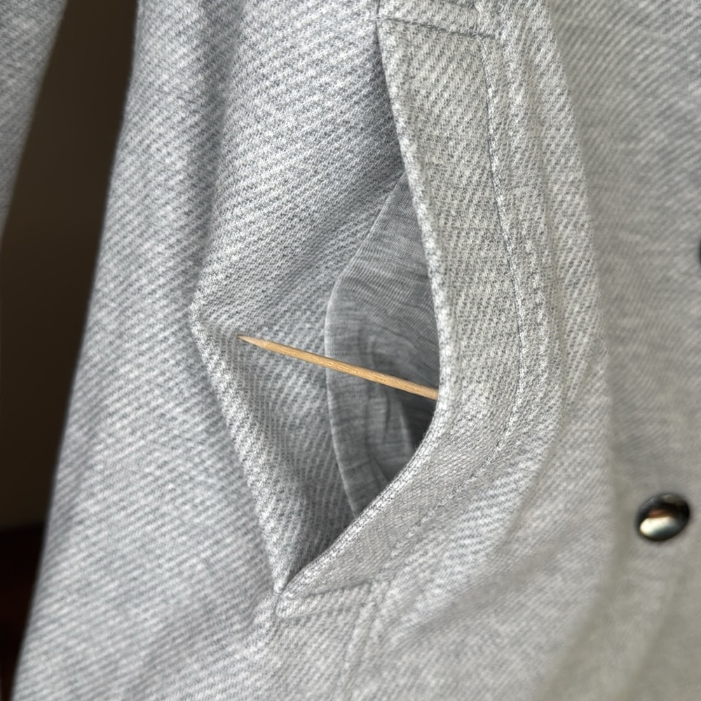 NWOT CAbi Calvary Heather Light Gray Twill
Ponte Snap Closure Jacket, M - Picture 11 of 16